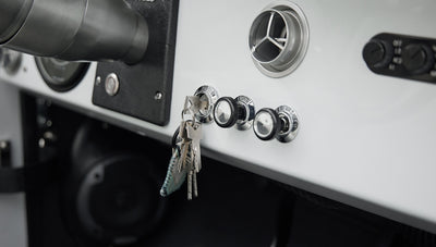 Classic Ford Bronco 1966 White Coyote Series dashboard with ignition keys inserted