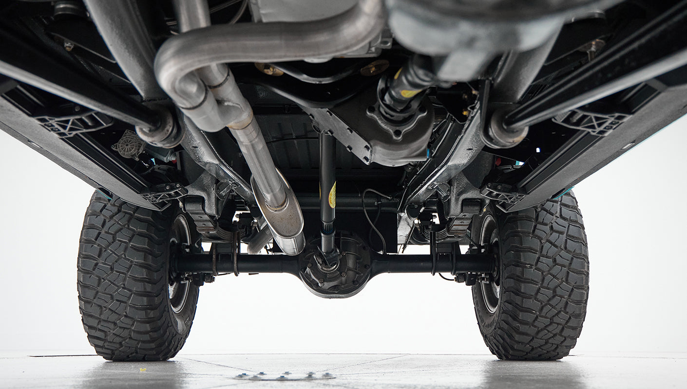 Undercarriage view showing exhaust pipe and differential housing of Classic Ford Bronco