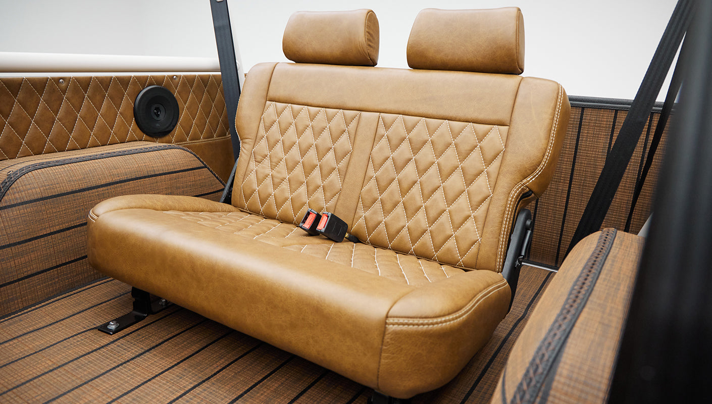 Rear bench seat in tan leather with diamond stitching inside Classic Ford Bronco