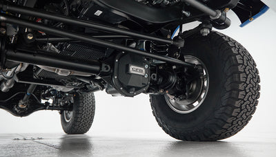 Underside view of suspension and tires of Classic Ford Bronco