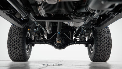 Complete underside view of Classic Ford Bronco showing axles and tires