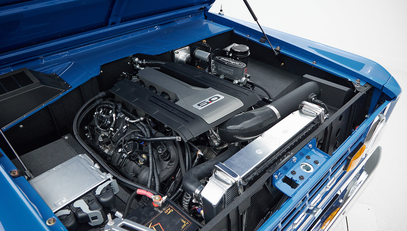 Engine compartment of Classic Ford Bronco with 5.0 engine visible