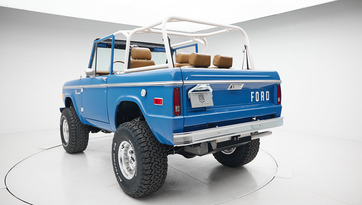 Close-up of rear left corner showing FORD lettering and lights on Classic Ford Bronco