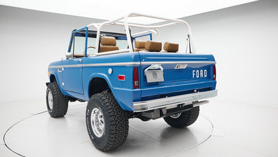 Close-up of rear left corner showing FORD lettering and lights on Classic Ford Bronco