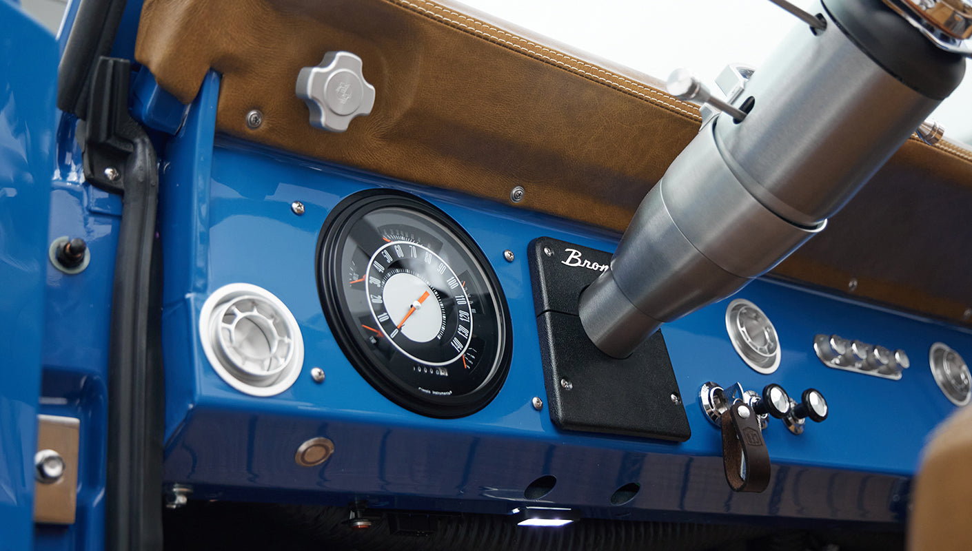 Detailed view of Classic Ford Bronco interior dashboard and controls