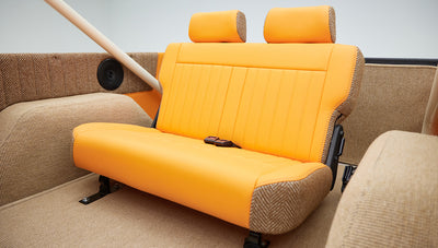 1973 Classic Ford Bronco in frozen blue with rolls royce orange leather and alpaca interior rear seat