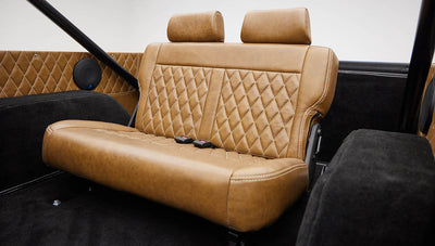 1976 classic ford bronco in blue patina paint with whiskey leather interior rear seat