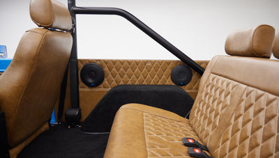 1976 classic ford bronco in blue patina paint with whiskey leather interior rear panel