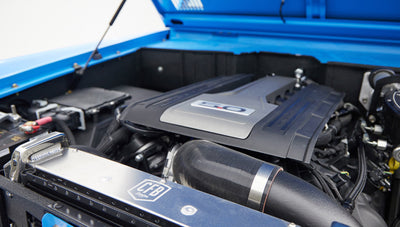 1976 classic ford bronco in blue patina paint with whiskey leather interior motor detail