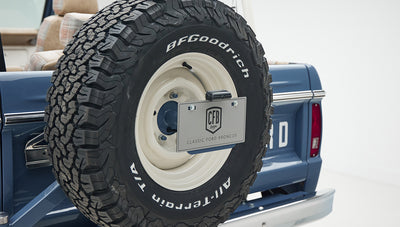 Close-up of BFGoodrich tire and Classic Ford Broncos branded rear license plate
