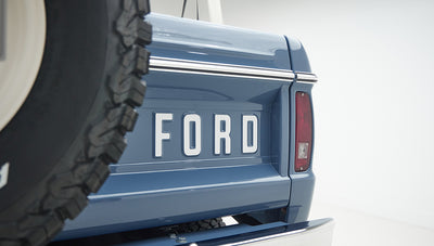 Partial rear view of Classic Ford Bronco tailgate with large FORD lettering
