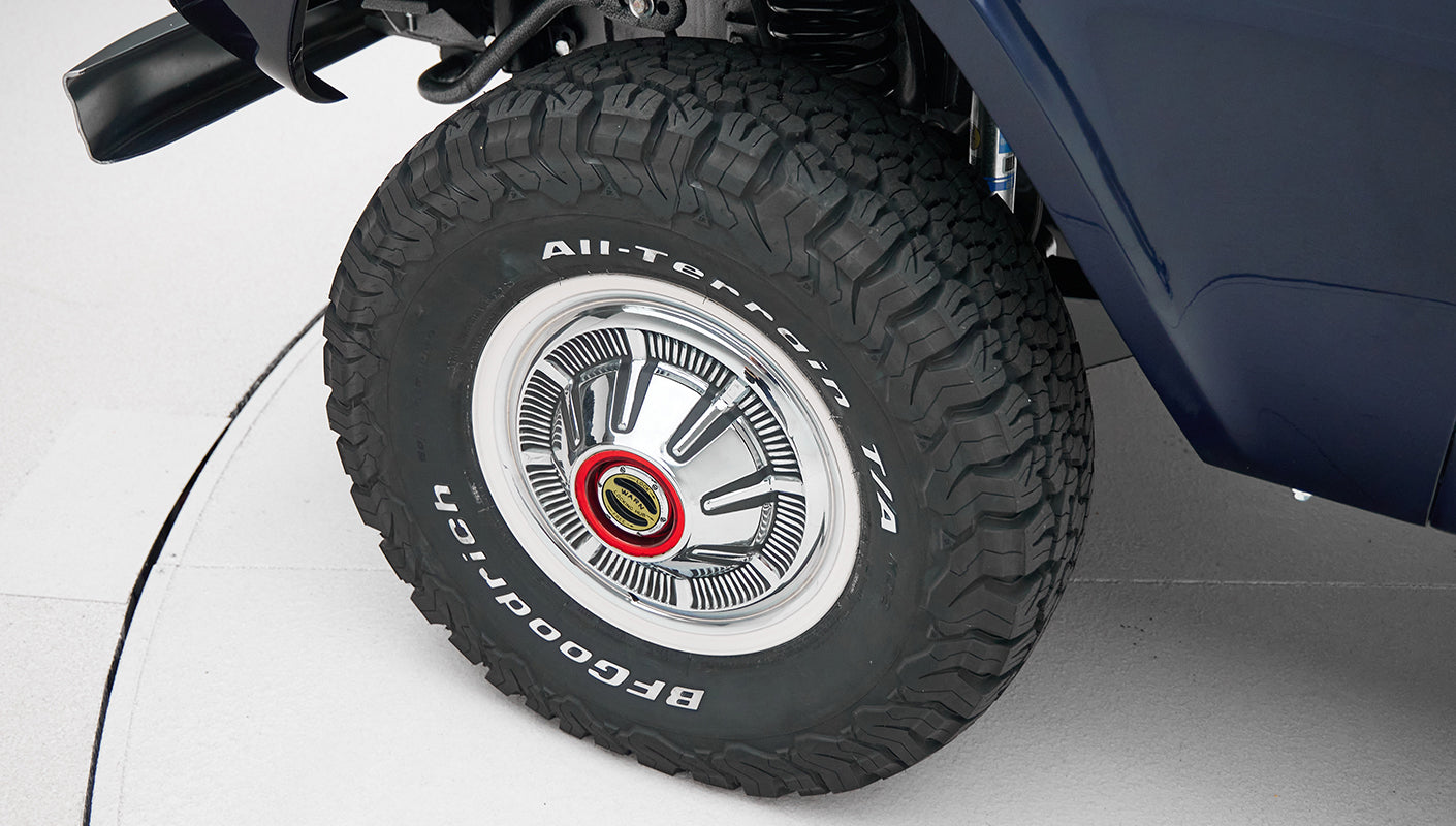 Close-up of BFGoodrich All-Terrain tire and chrome wheel on Classic Ford Bronco