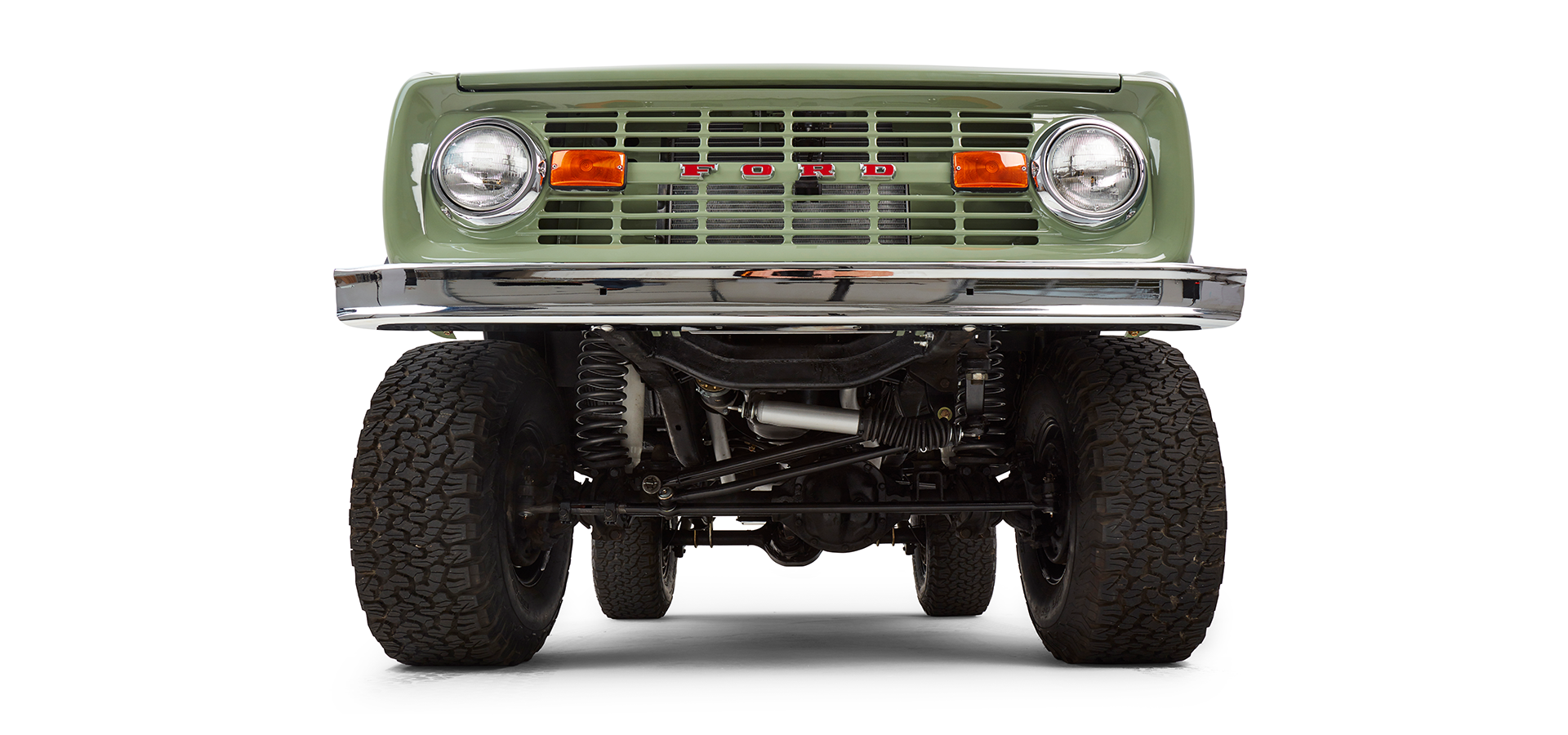 Underneath front suspension and steering components of a Classic Ford Bronco