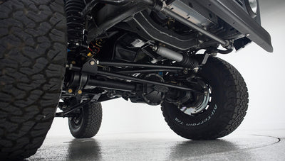 Undercarriage view of Classic Ford Bronco suspension and front tires