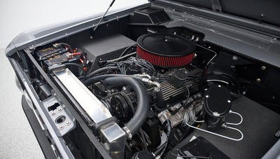Engine bay close-up showing air filter and other engine details of Classic Ford Bronco