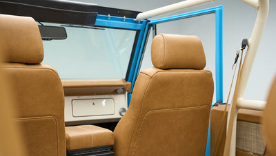 Interior view showing front seats and dashboard of Classic Ford Bronco