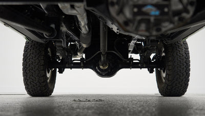 Undercarriage drivetrain of a Classic Ford Bronco, showing differential and axle