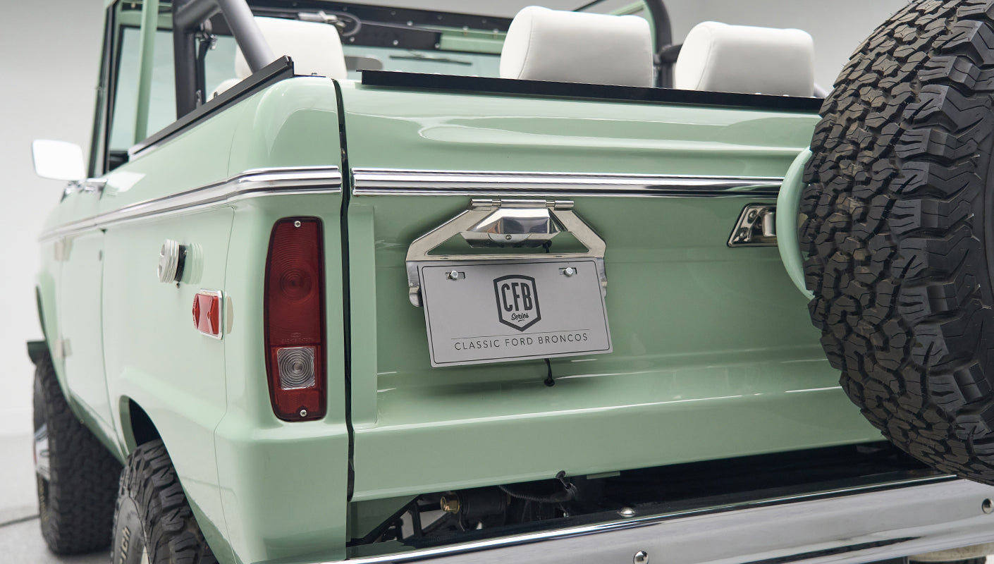 Tailgate and rear light of green Classic Ford Bronco with CFB license plate