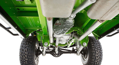 Underside of bright green Classic Ford Bronco showing suspension and exhaust system