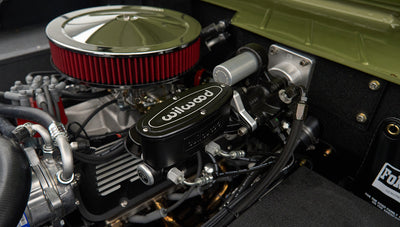 Closeup of Wilwood brake components and hoses inside Classic Ford Bronco engine bay