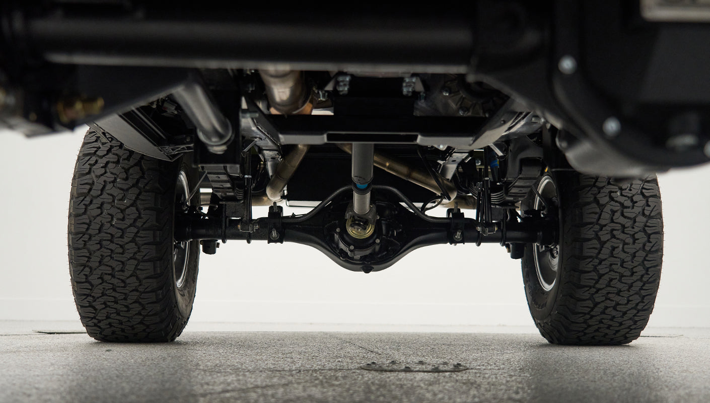 Undercarriage rear axle and suspension with tires on Classic Ford Bronco truck