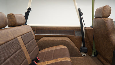 Rear bench seat view with headrest and part of back door interior in Classic Ford Bronco Lime Gold