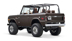 Classic Ford Bronco rear-side view with matte brown paint and open cabin