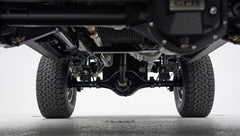 Rear suspension and axle close-up of Classic Ford Bronco with tires visible