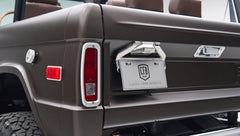 Classic Ford Bronco rear corner with tail lights and license plate showing CFB Series