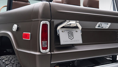 Classic Ford Bronco rear corner with tail lights and license plate showing CFB Series