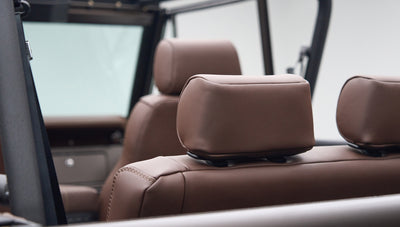 Brown leather rear seats with headrests inside Classic Ford Bronco