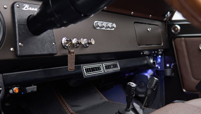 Control knobs and air vents on dashboard of Classic Ford Bronco interior