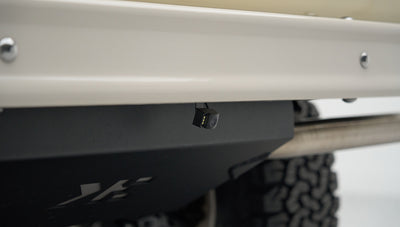 Backup camera mounted below the rear bumper of Classic Ford Bronco
