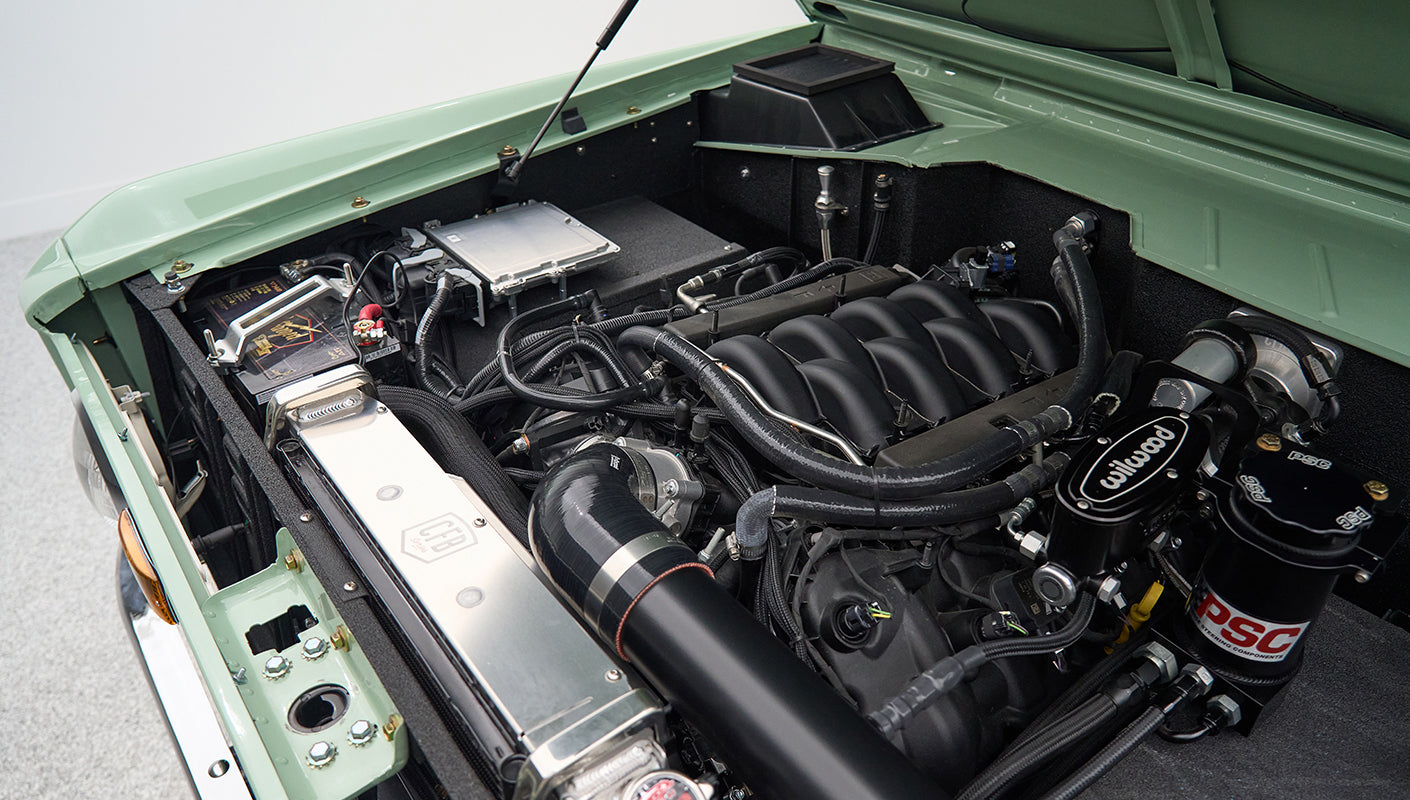 Detailed view of Classic Ford Bronco engine components including Wilwood and PSC parts