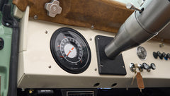 Pedal assembly and rubber floor mat under Classic Ford Bronco dashboard