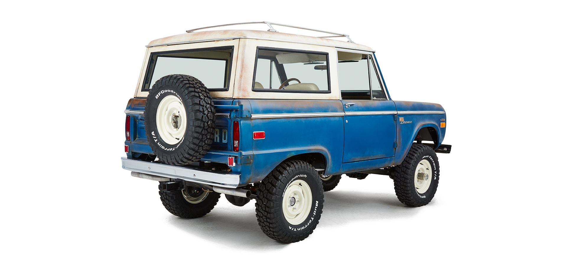Classic Ford Bronco rear passenger side angled view highlighting body and wheels