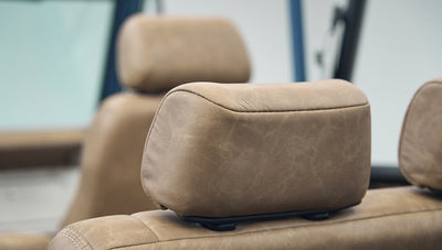 Close-up of brown leather headrest in Classic Ford Bronco interior