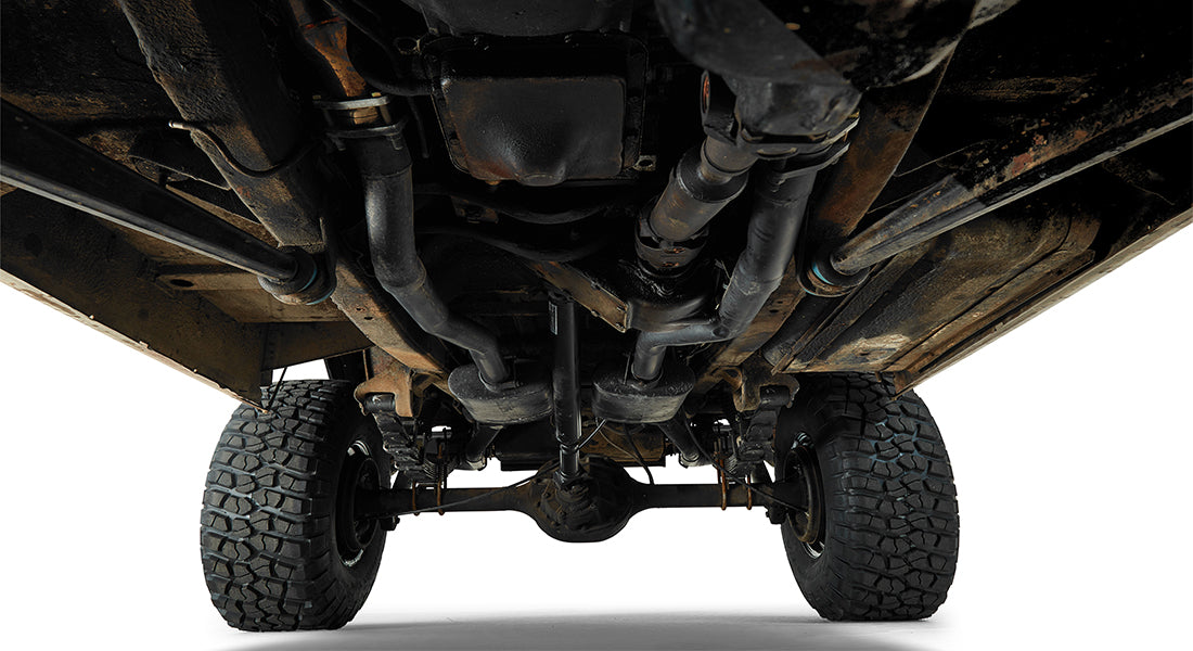 Undercarriage front to rear view of Classic Ford Bronco showing chassis and drivetrain