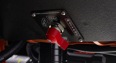 Red toggle switch and black panel labeled Off, On, Battery with visible text