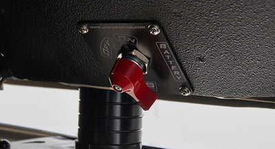 Battery switch panel with red toggle mounted under dashboard inside Classic Ford Bronco