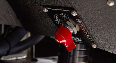 Red battery switch toggle mounted inside Classic Ford Bronco