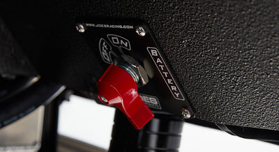 Battery tender switch panel with red toggle switch mounted inside Classic Ford Bronco