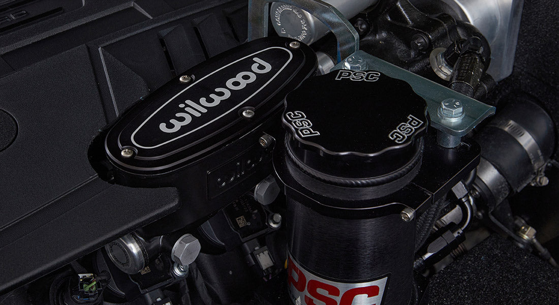 Close-up of Wilwood brake assembly component in engine compartment