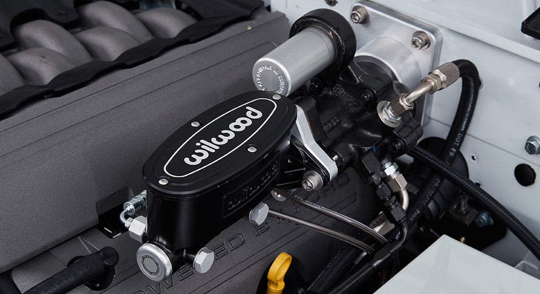 Wilwood brake master cylinder and engine parts inside the Classic Ford Bronco engine bay