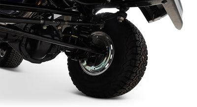 Undercarriage view featuring tire, axle, and suspension components of Classic Ford Bronco