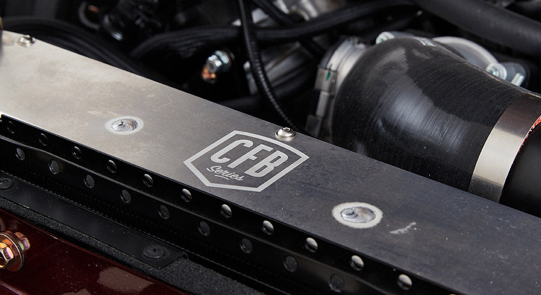 Engine bay detail featuring metal component labeled CFB Series on a Classic Ford Bronco