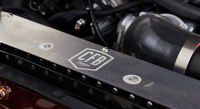 Engine bay detail featuring metal component labeled CFB Series on a Classic Ford Bronco