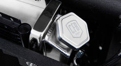 Close-up of metal component engraved with CFB Series logo in Classic Ford Bronco engine bay