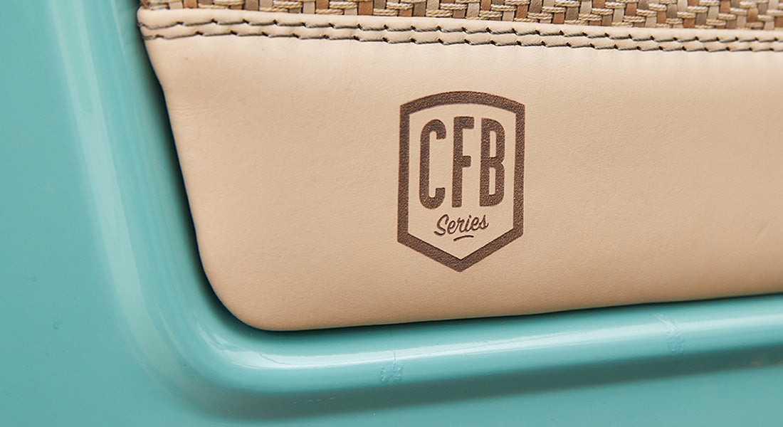 Close-up of leather interior panel embossed with CFB Series branding on a Classic Ford Bronco.