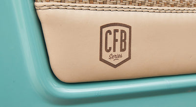 Close-up of leather interior panel embossed with CFB Series branding on a Classic Ford Bronco.